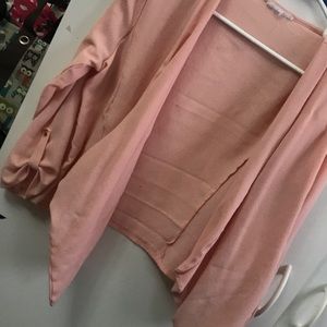 A pink dressy polyester cover up